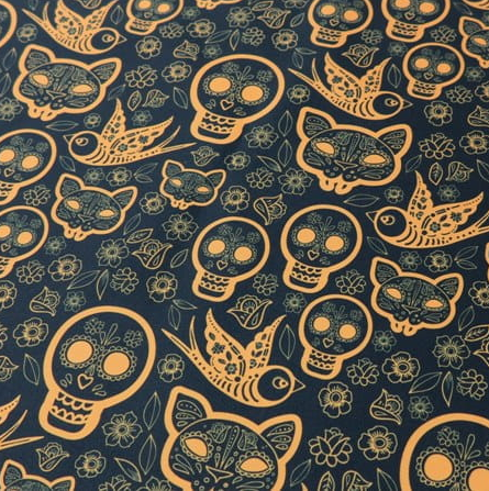 orange skulls folk fabric